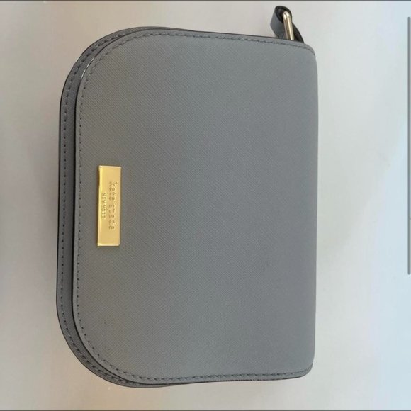 Kate Spade Cross body small bag - strap is matching color to the bag